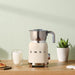 EAN 8017709316075 - Smeg MFF11CREU espumador o calentador de leche Automatic milk frother/warmer Crema de color imagen 8