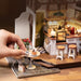 EAN 6946785119312 - ROBOTIME DG162 Casa en miniatura y rincón de libros para montar Casa en miniatura para montar imagen 6