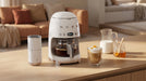 EAN 8017709353148 - Smeg MFF02WHEU espumador o calentador de leche Calentador/espumador de leche automático Blanco imagen 26