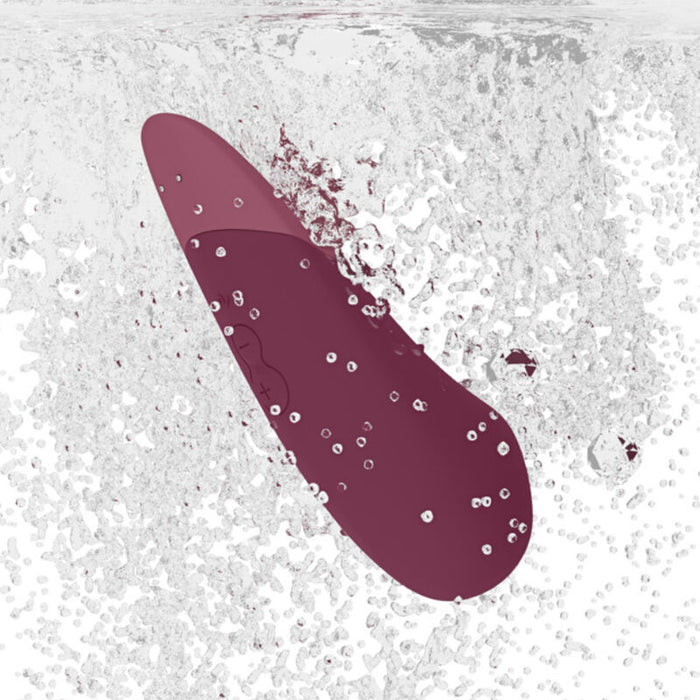 Womanizer - Vibe Vibrador Lay-on Silencioso Rosa Oscuro